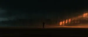 Pátio de contêineres à noite, com uma pessoa sozinha diante da carga iluminada ao fundo