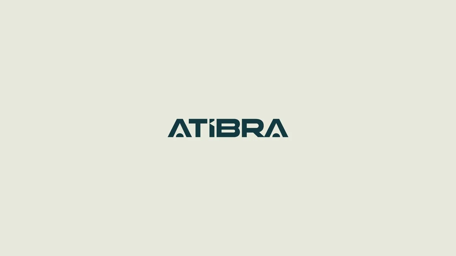 Atibra Logotipo Atibra em verde petróleo sobre fundo cinza claro